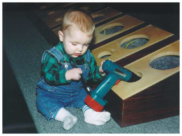 Grandson, Riley builds speakers