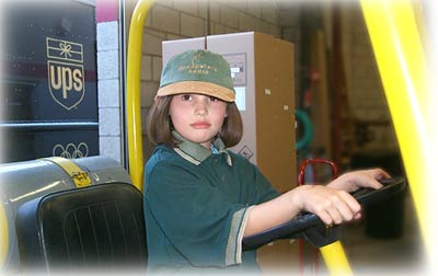 Brittany drives the forklift